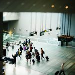 Large group travelers at an airport for Puerto Vallarta transportation
